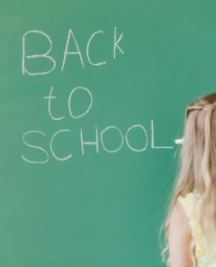 blonde-girl-writing-chalkboard