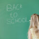 blonde-girl-writing-chalkboard