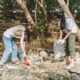 Group of asian diverse people volunteer teamwork ,environment conservation,volunteer help to picking plastic and foam garbage on park area.Volunteering world environment day.