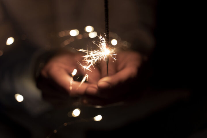 view-hands-holding-sparkles